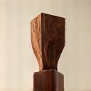 Sculpted wooden award trophy, signifying craftsmanship excellence.